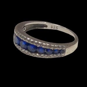 Beautiful ring with blue stones. Approximate size 5.5